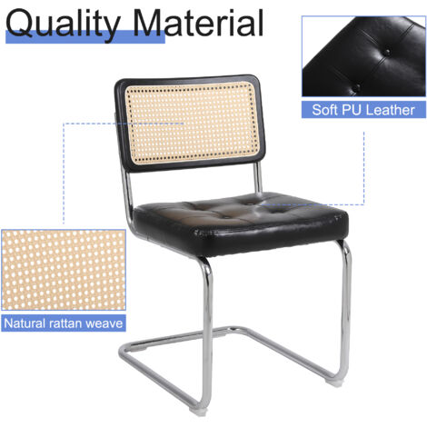 Lot de 2 chaises à manger médiévales en rotin. Dossier treillis sans accoudoirs,rembourrage souple,pieds métalliques chromés noirs.