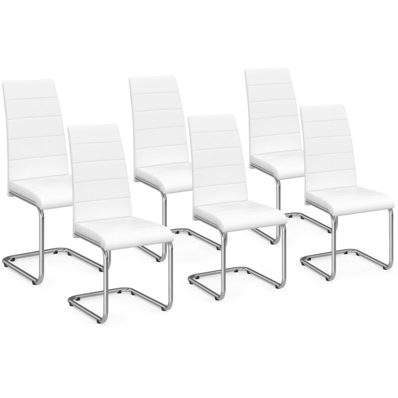 Chaises blanches de salle à manger