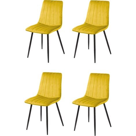 Lot de quatre chaises de salle à manger de style vintage avec assise et dossier en velours Denia jaune moutarde.