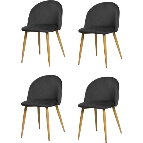 Lot de quatre chaises de salle à manger de style vintage avec assise et dossier en velours modèle Pedraza en couleur noire.