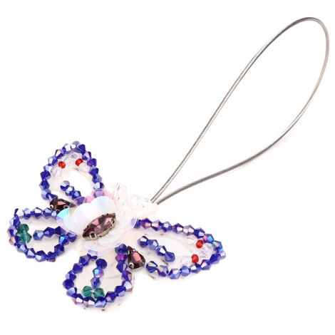 Magnetische und elegante blaue Strass-Schmetterlings-Vorhangstopper auf weißem Hintergrund