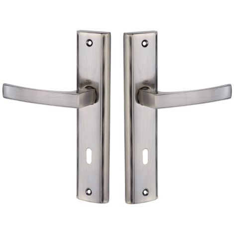 Manija de puerta en placa larga, llave Aria Patina