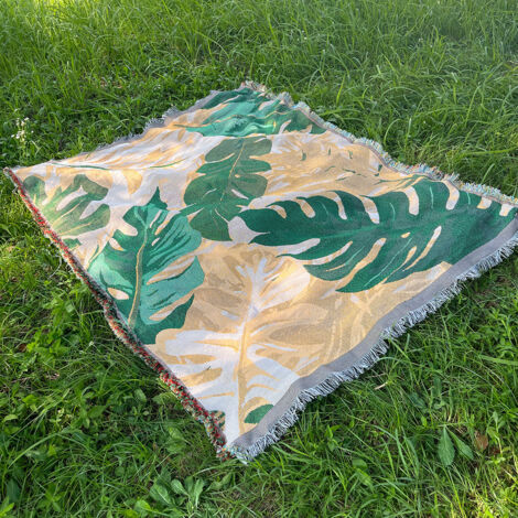 Manta de picnic/camping de 180 x 130 cm con estampado de hojas tropicales.