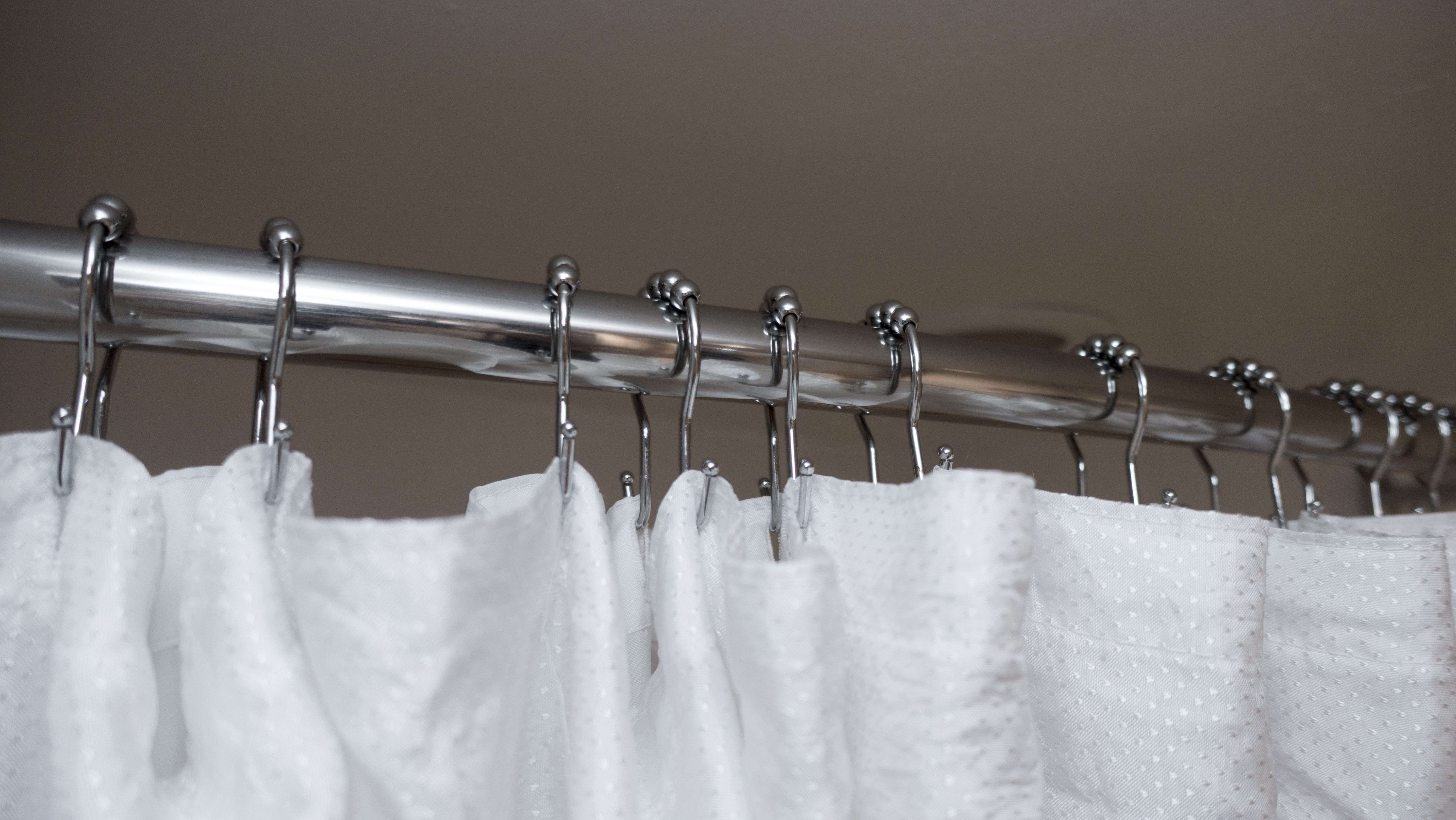 Cómo elegir la barra y las anillas para una cortina de ducha