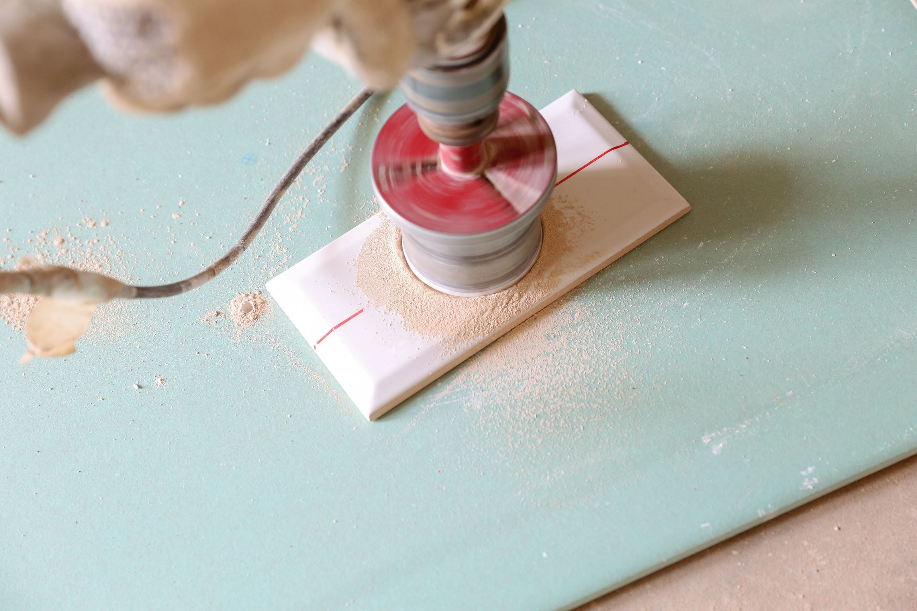 How to drill through tile