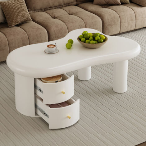 Mesa de centro blanca irregular, ideal para salón o dormitorio. Fabricada en MDF, con 2 cajones. Medidas: 97 × 64 × 42 cm