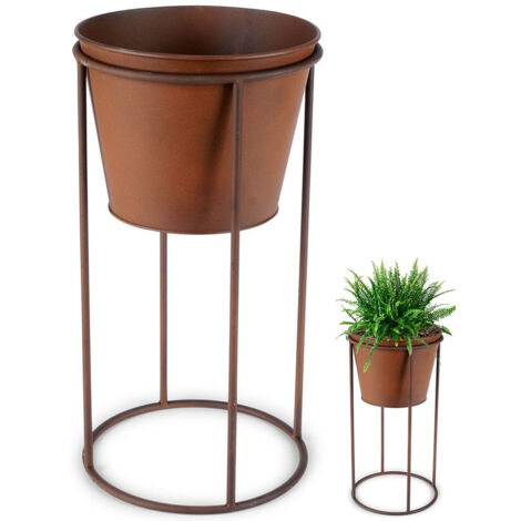 Metal flower pot on stand with rust effect