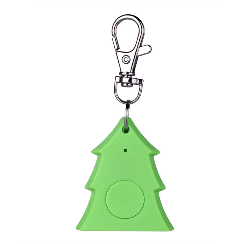 

Mini diseño de arbol de Navidad Buscador de llaves con alarma inteligente Rastreador anti-perdida Inalambrico BT 4.0 Obturador para selfies Grabacion