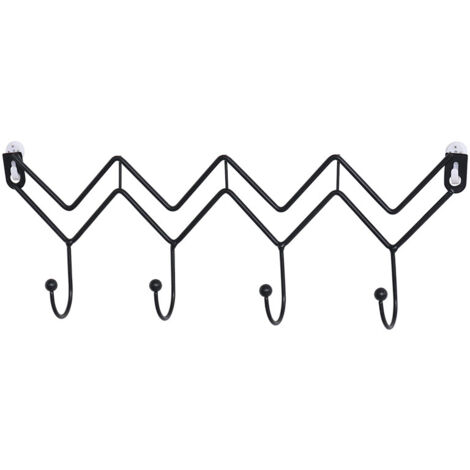 Nordisch-minimalistischer, schwarzer, wellenförmiger Haken für die Wandgestaltung im Wohnzimmer