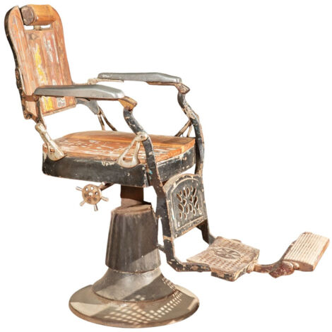 Old restored barber's chair armchair