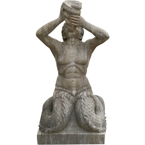Old stone statue of a kneeling man