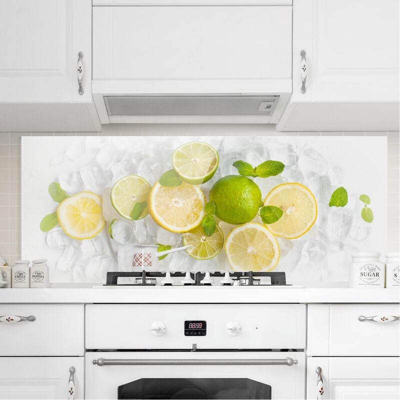 

Panel antisalpicaduras de cristal - Citrus Fruits On Ice - Panorámico Dimensión LxA: 50cm x 125cm