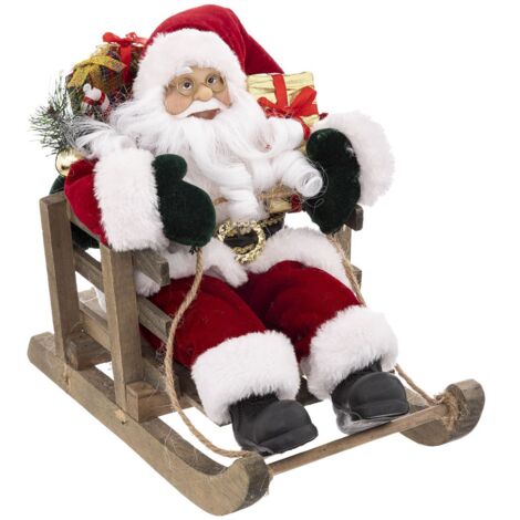 Père Noël en habit traditionnel velours rouge sur sa luge 26 x 15 x 26 cm - Feeric Christmas