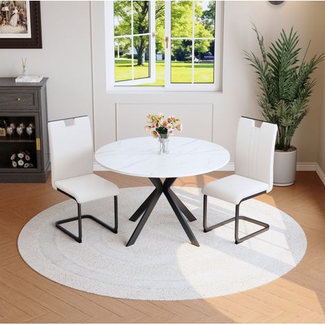 Set da pranzo con tavolo rotondo effetto marmo, sedie in PU, MDF e metallo, bianco (1/5)