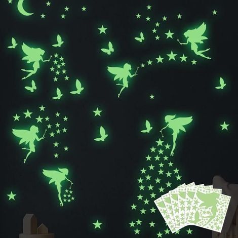Glow-in-the-dark wall stickers of stars and planets for a girl's room.