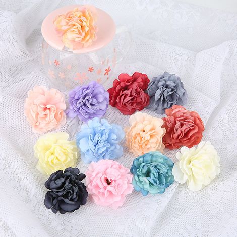 Künstliche Nelken mit gebrannten Rändern, Seidenblumen, künstliche Blumenkränze, Kopfschmuck, Blumenarrangements für Salons und andere florale Artikel. (1/5)