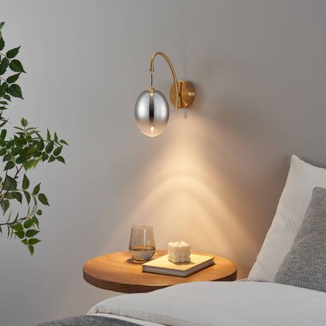 Goldene bogenförmige LED-Wandleuchte mit hängender ovaler Kugel - Nuvéo (1/5)