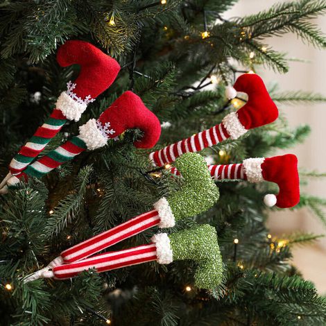3 articles de Noël : un crochet en forme de branche de 38 cm de long, des bottes, une peluche, un ressort à remonter et des décorations de Noël. (1/5)