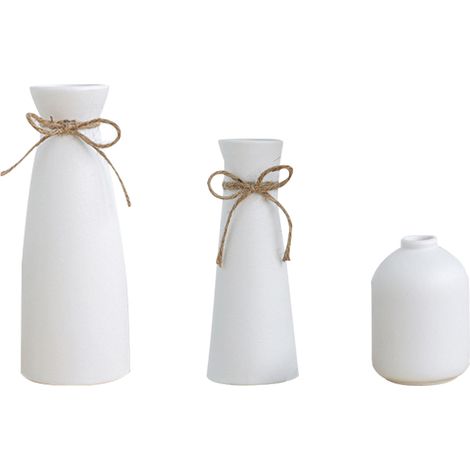 Jarrones de cerámica en juegos de 3 o 5 unidades, blancos o negros, fabricados en cerámica resistente a altas temperaturas, de diseño minimalista para salón o decoración. (1/5)