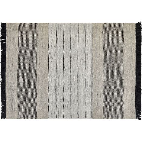 Alfombra de lana beige claro negro 160 x 230 cm hecho a mano borlas Yazlik