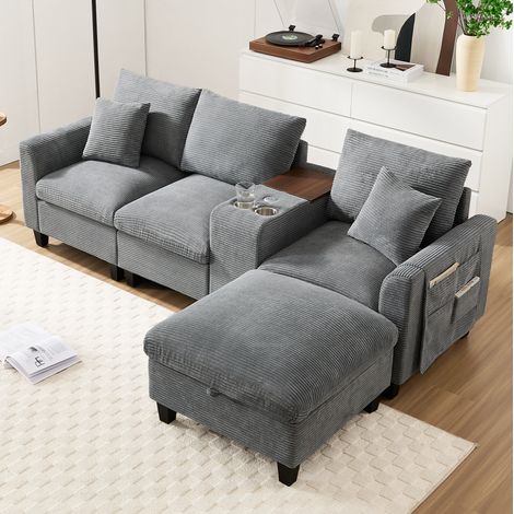 Divano angolare L moderno 4 posti in tessuto corduroy grigio con console USB e portabicchieri (1/5)