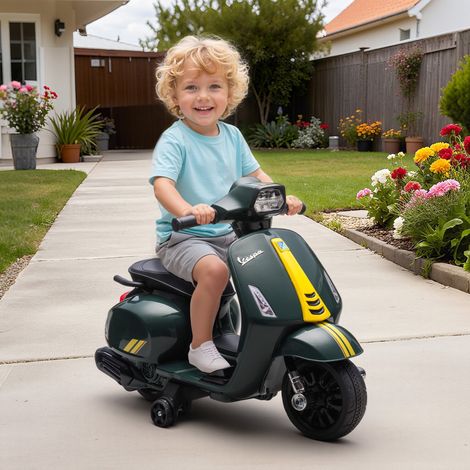Motocicleta eléctrica Vespa con licencia oficial para niños, patinete infantil con batería recargable de 6 V, ruedines, luces y claxon, para edades de 2 a 6 años, color verde oscuro.