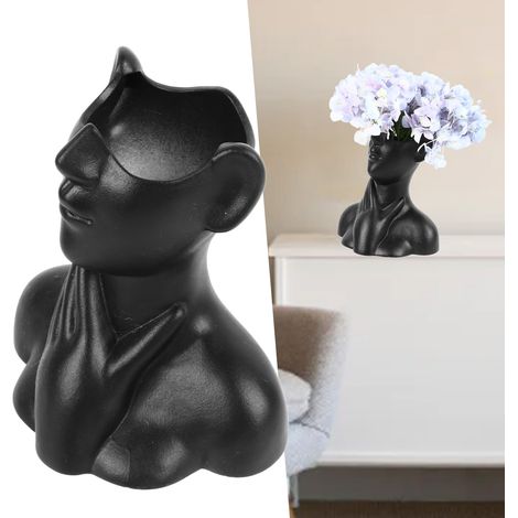 Grand vase séduisant en céramique noire à motif de visage (1/5)