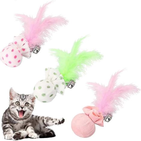 Balle interactive pour chat avec clochette et ressort, idéale pour l'entraînement et le jeu de mastication. (1/5)