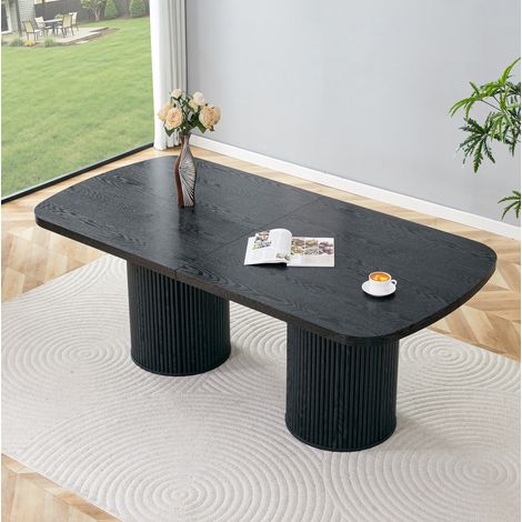 Table à manger ovale en MDF noir, 6 à 8 places, pieds cylindriques rainurés, finition effet bois, style Wabi-Sabi, résistante à l'eau – de FLORAGRACE (1/5)