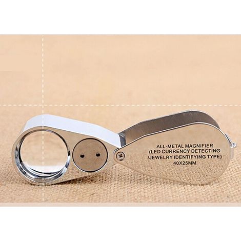 Loupe de poche à fort grossissement (40x) pour l'expertise de bijoux anciens, avec détecteur de faux billets à LED intégré. (1/5)