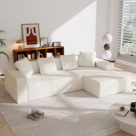 Canapé sans structure entièrement compressé (incluant une méridienne en forme de L) — Un canapé modulaire moderne au design à assise profonde et au revêtement luxueux, idéal pour les salons et les cha (1/5)