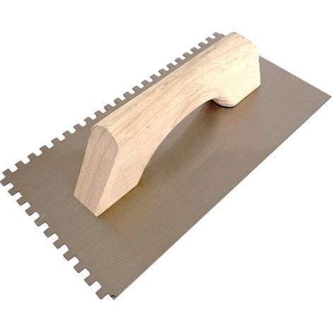 Le peigne en caoutchouc gris dentelé mesure 28 cm de long, 14 cm de large et 10 cm de haut. (1/2)