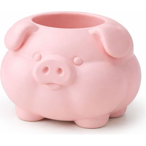 Ein Behälter in Form eines dicken, rosa Schweinchens