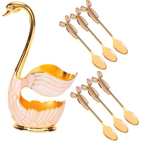 Ensemble de vaisselle comprenant cuillères à café, à fruits et à dessert, avec support décoratif en forme de cygne (cuillère dorée et blanche). (1/5)