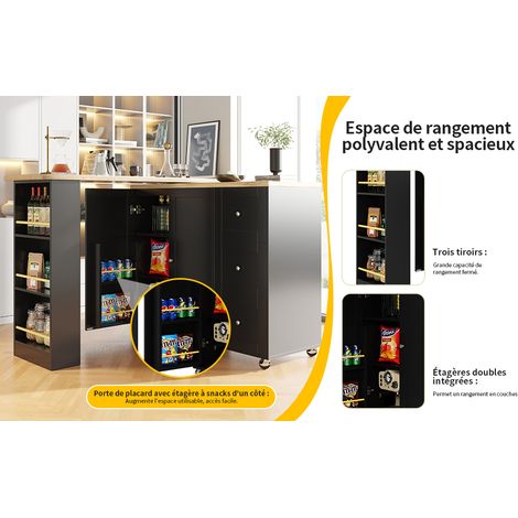 Table de repas pivotante sur 360°, mesurant 135–203 x 39 x 106 cm. Se compose de roulettes. Tablette noire, équipée de trois tiroirs. Inclut également un support pour les snacks. (1/5)