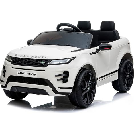 Auto Elettrica Bambini Range Rover Evoque 12V con Licenza Ufficiale Ruote in Gomma EVA Sedile in Pelle Cintura 5 Punti Telecomando 2.4GHz Luci LED Bluetooth MP3 USB Tappetini Inclusi Bianco
