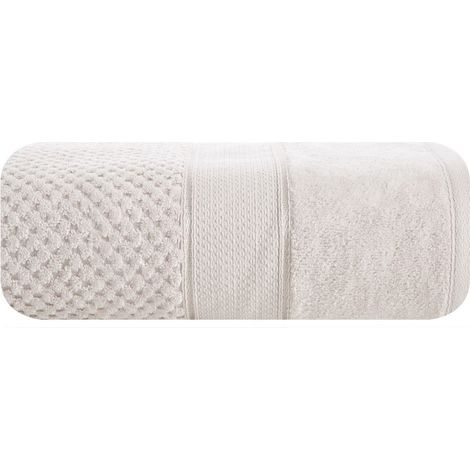 Toalla Jessi de 50x90 cm, color beige, rizo de 500 g/m², con textura de cuadros en relieve y borde de terciopelo.
