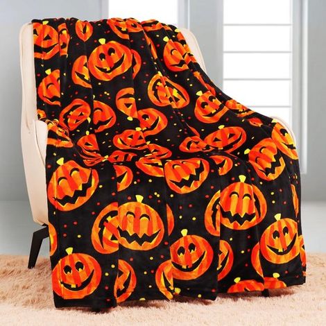 Plaid d'Halloween à motif citrouille, couverture polaire douce 100 x 150 cm, couverture décorative chaude pour canapé, fauteuil et chambre, idéale pour l'automne et Halloween (1/2)