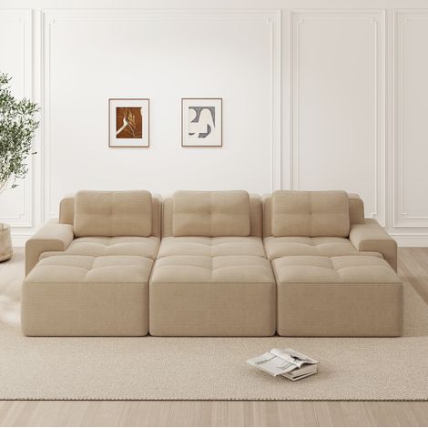 Divano angolare modulare beige in velluto a coste con funzione letto e 3 pouf, seduta profonda 74 cm (1/5)