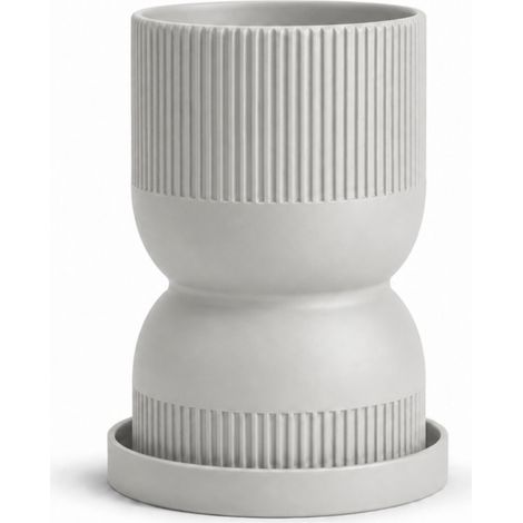 Vaso da fiori grigio a forma di clessidra con sottovaso moderno.