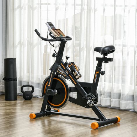 Cyclette con volano da 8 kg, schermo LCD, cardiofrequenzimetro, sella e manubrio regolabili, 103x48x115 cm, arancione.
