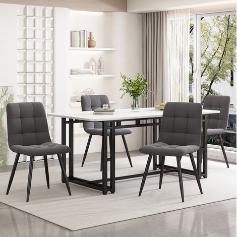 Mesa de comedor 140x80 cm negra y blanca en MDF con patas metálicas negras, estilo moderno (1/5)
