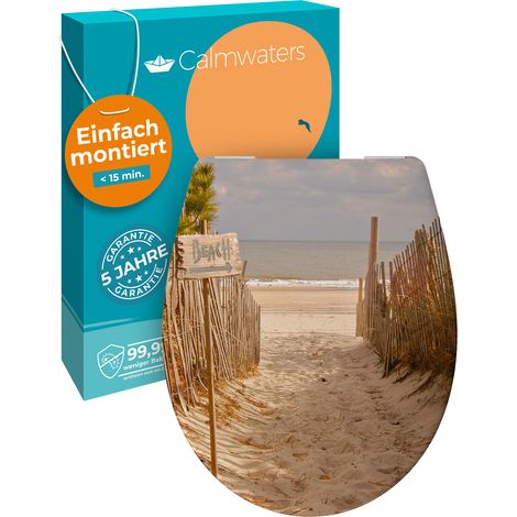 Calmwaters® WC Sitz Motiv Sandstrand einfache Montage, Toilettendeckel bis 250 kg, Made in EU, antibakterieller Duroplast, Absenkautomatik, 2 Montage Optionen, abnehmbar, Klobrille, oval (1/5)