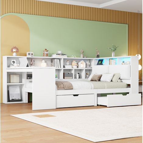 Letto a piattaforma a L moderno in MDF bianco 140x200 cm con testiera imbottita, scrivania integrata, libreria e LED