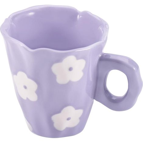 Esta taza de café de cerámica presenta un diseño único, irregular y pintado a mano, lo que la convierte en una opción ideal tanto para la oficina como para el hogar. (1/4)