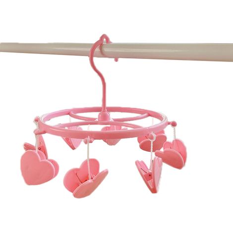 Wandmontierter Handtuchhalter aus Kunststoff mit rosa herzförmigen Wäscheklammern für Unterwäsche und Socken – ideal für ein Studentenzimmer