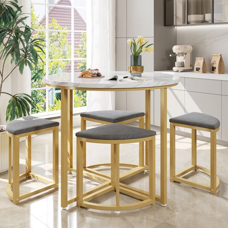Set da pranzo con tavolo rotondo da 80 cm e 4 sedie, piano in MDF bianco, sedute in velluto grigio, struttura in metallo dorato, salvaspazio – CHICFURN (1/5)