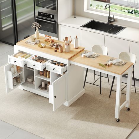 Isola cucina mobile 112-188 x 45 x 92 cm con piano estensibile, 3 cassetti, vani contenitori e finitura bianco naturale. (1/5)