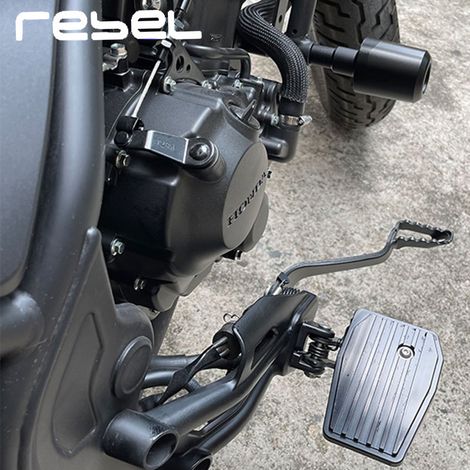 Widened front footrest bracket for Honda CM500 and CM300 Rebel models. (1/4)