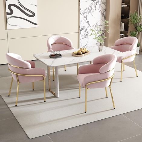 Chaise de salle à manger individuelle, style luxueux et léger, idéale pour le salon, la chambre ou comme chaise de détente. Pieds en métal, revêtement en velours rose.